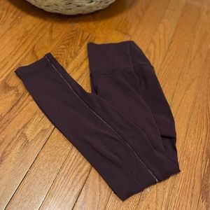 Lululemon size 6 plum colored tights